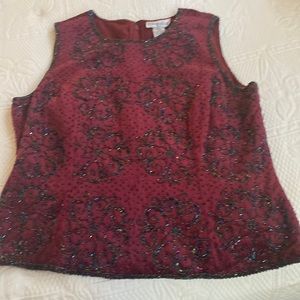 Wine background top with black beading, zips from top to waiste. Size XL